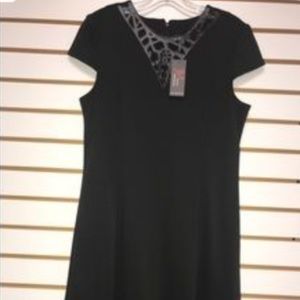 Cute black dress with Faux leather detail
